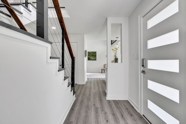 118 Hickory Pnes, Livingston, TX 77351 - entrance foyer with light wood-type flooring and stairs