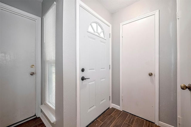 10318 Rockcrest Dr, Houston, TX 77041 - foyer entrance featuring dark wood-type flooring