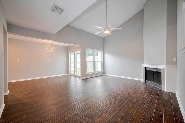 10318 Rockcrest Dr, Houston, TX 77041 - unfurnished living room featuring a chandelier, a fireplace, dark wood finished floors, a ceiling fan, and high vaulted ceiling