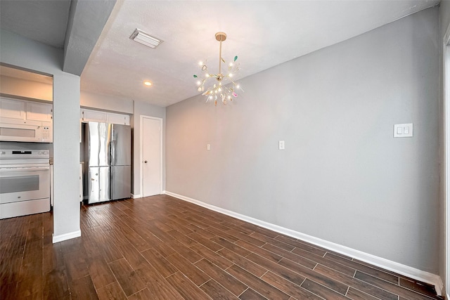 10318 Rockcrest Dr, Houston, TX 77041 - unfurnished dining area featuring dark wood-type flooring and a chandelier