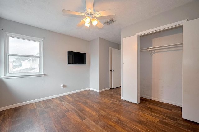 10318 Rockcrest Dr, Houston, TX 77041 - unfurnished bedroom with wood finished floors, a closet, and a ceiling fan