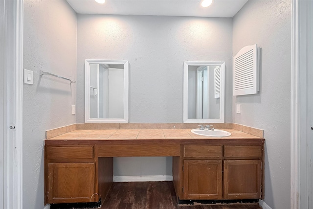 10318 Rockcrest Dr, Houston, TX 77041 - bathroom featuring vanity and wood finished floors