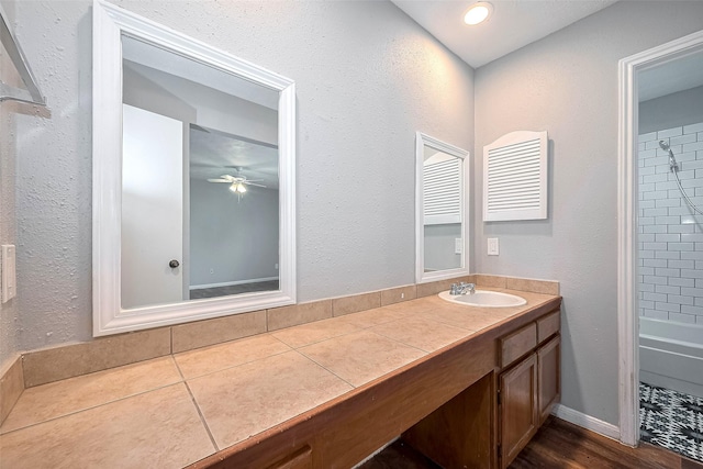 10318 Rockcrest Dr, Houston, TX 77041 - bathroom with vanity, washtub / shower combination, ceiling fan, and wood finished floors