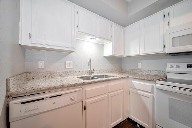 10318 Rockcrest Dr, Houston, TX 77041 - kitchen featuring white appliances, a textured wall, white cabinetry, and light stone counters