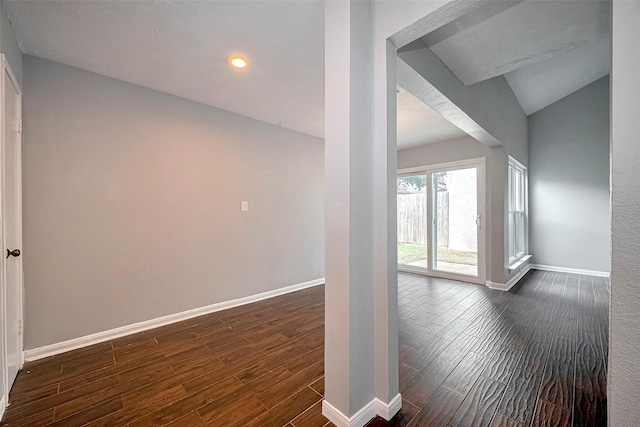 10318 Rockcrest Dr, Houston, TX 77041 - empty room with dark wood finished floors, recessed lighting, and vaulted ceiling