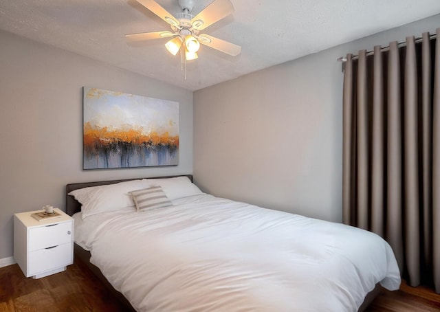 10318 Rockcrest Dr, Houston, TX 77041 - bedroom featuring wood finished floors and a ceiling fan