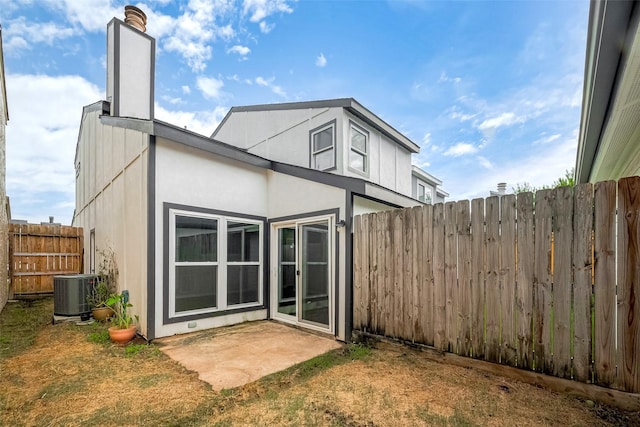 10318 Rockcrest Dr, Houston, TX 77041 - back of house with stucco siding and a patio