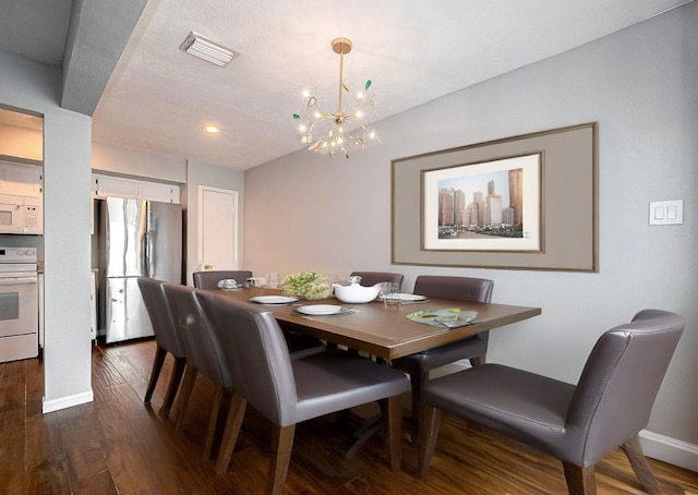 10318 Rockcrest Dr, Houston, TX 77041 - dining space featuring a chandelier and dark wood finished floors