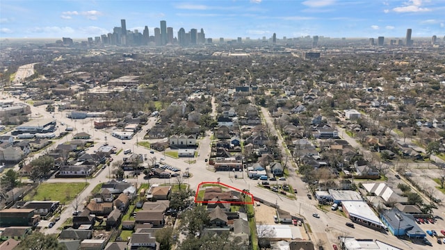 4110 N Main St, Houston, TX 77009 - aerial overview of property's location featuring city skyline and property boundaries highlighted