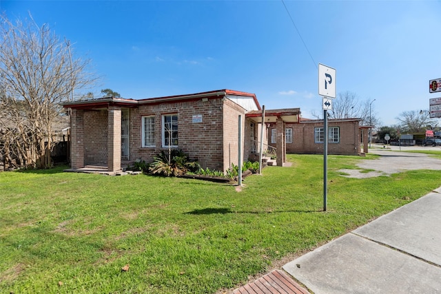 4110 N Main St, Houston, TX 77009 - single story home featuring brick siding and a front yard