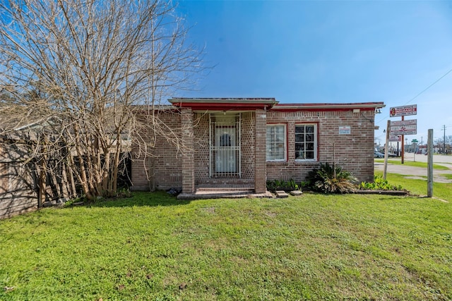 4110 N Main St, Houston, TX 77009 - single story home featuring brick siding and a front lawn