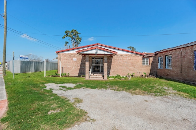 4110 N Main St, Houston, TX 77009 - rear view of property featuring brick siding