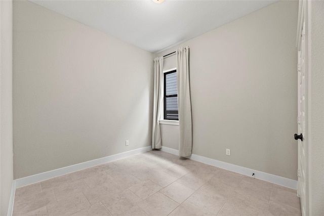 15247 Parkland Canyon Dr, Cypress, TX 77433 - spare room with baseboards and light tile patterned floors