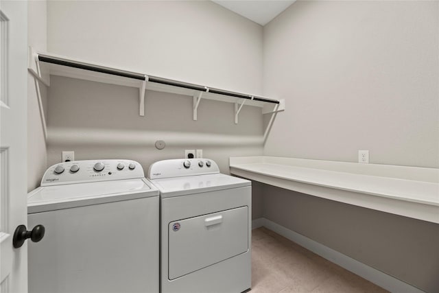 15247 Parkland Canyon Dr, Cypress, TX 77433 - washroom with washing machine and dryer and baseboards