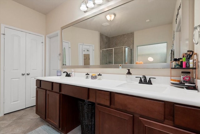 30119 Saw Oaks Dr, Magnolia, TX 77355 - bathroom with a stall shower, double vanity, and tile patterned floors
