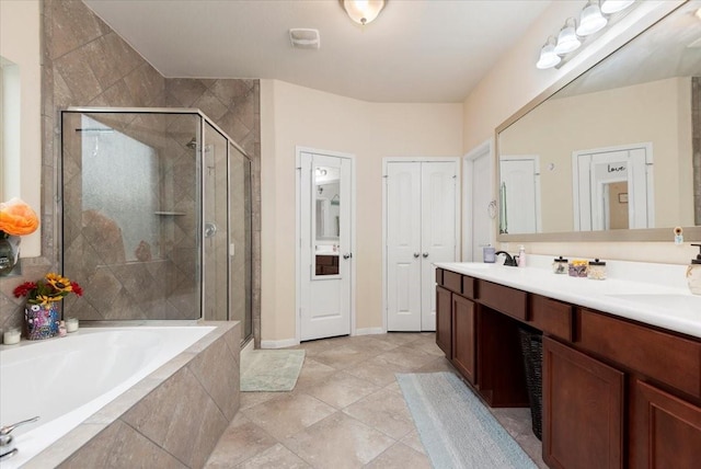 30119 Saw Oaks Dr, Magnolia, TX 77355 - full bath featuring a stall shower, a garden tub, and double vanity