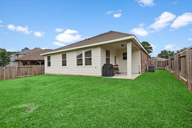 30119 Saw Oaks Dr, Magnolia, TX 77355 - rear view of house with a patio area, a fenced backyard, and roof with shingles