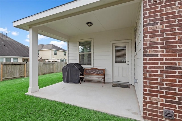 30119 Saw Oaks Dr, Magnolia, TX 77355 - fenced backyard featuring area for grilling and a patio area