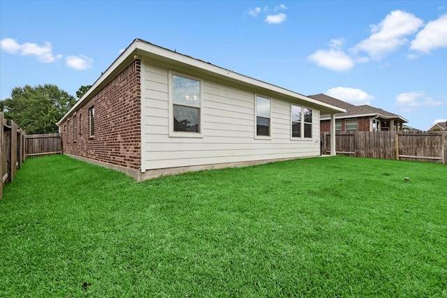 30119 Saw Oaks Dr, Magnolia, TX 77355 - back of house with brick siding and a fenced backyard