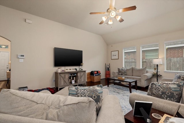 30119 Saw Oaks Dr, Magnolia, TX 77355 - living area with a ceiling fan, arched walkways, vaulted ceiling, and wood finished floors