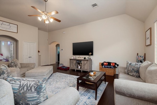 30119 Saw Oaks Dr, Magnolia, TX 77355 - living area with arched walkways, ceiling fan, dark wood-style floors, and vaulted ceiling