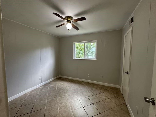 7717 Bigwood St, Houston, TX 77016 - empty room featuring a ceiling fan and light tile patterned floors