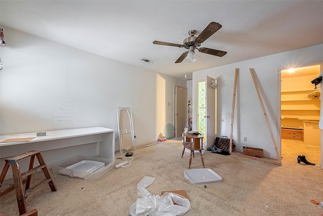 25107 Broughton St, Spring, TX 77373 - living area with a ceiling fan and carpet