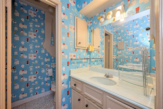 25107 Broughton St, Spring, TX 77373 - bathroom with vanity and wallpapered walls