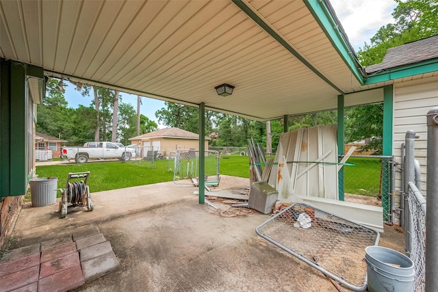 25107 Broughton St, Spring, TX 77373 - view of patio / terrace featuring a storage unit