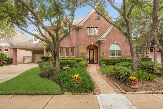 15411 Driftwood Oak Ct, Houston, TX 77059 - traditional home featuring brick siding, concrete driveway, and a garage