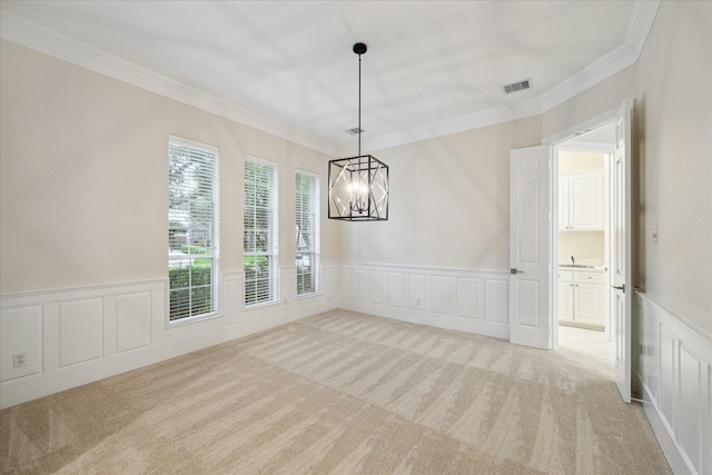 15411 Driftwood Oak Ct, Houston, TX 77059 - unfurnished room with light colored carpet, a decorative wall, a chandelier, ornamental molding, and a wainscoted wall