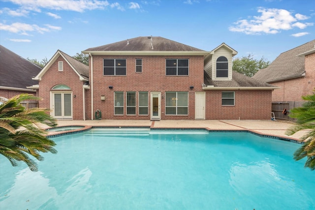 15411 Driftwood Oak Ct, Houston, TX 77059 - view of swimming pool featuring a patio area and a pool with connected hot tub
