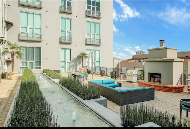 2000 Bagby St Unit 9420, Houston, TX 77002 - view of home's community with a patio area and an outdoor hangout area