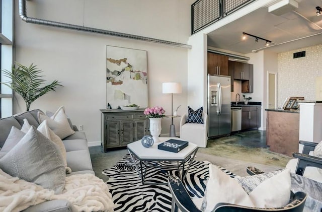 2000 Bagby St Unit 9420, Houston, TX 77002 - living room with a high ceiling and rail lighting