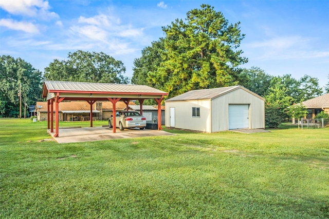 91 E Post Oak Ln, Shepherd, TX 77371 - view of grassy yard with an outbuilding, a detached garage, and a detached carport