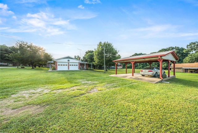 91 E Post Oak Ln, Shepherd, TX 77371 - view of green lawn with a detached carport and a garage