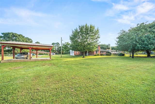 91 E Post Oak Ln, Shepherd, TX 77371 - view of grassy yard with a detached carport