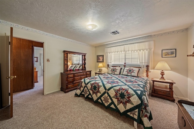 91 E Post Oak Ln, Shepherd, TX 77371 - bedroom featuring light carpet and a textured ceiling