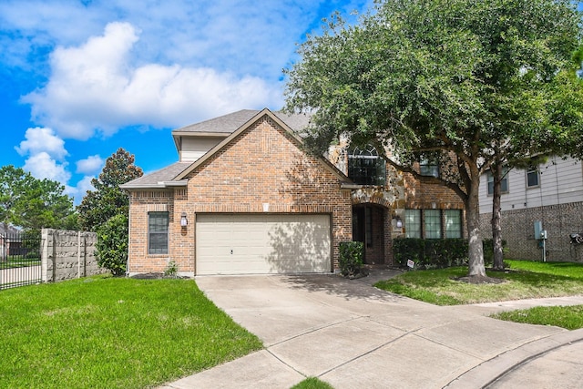 6034 Gracys Landing Ln, Katy, TX 77494 - traditional home with brick siding, a garage, driveway, and a shingled roof