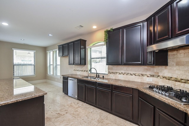 6034 Gracys Landing Ln, Katy, TX 77494 - kitchen featuring appliances with stainless steel finishes, under cabinet range hood, stone countertops, backsplash, and recessed lighting