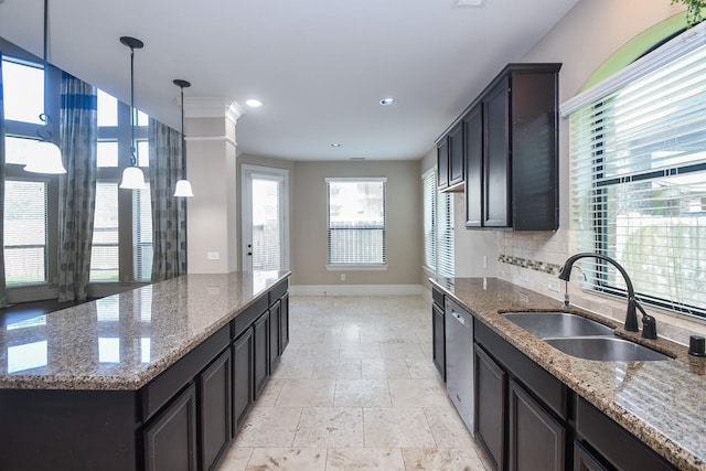 6034 Gracys Landing Ln, Katy, TX 77494 - kitchen featuring stainless steel dishwasher, recessed lighting, light stone counters, a center island, and stone tile floors