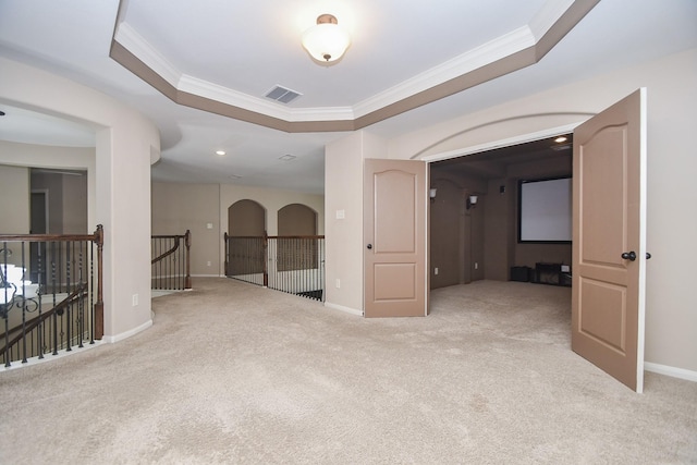 6034 Gracys Landing Ln, Katy, TX 77494 - carpeted empty room featuring ornamental molding and a raised ceiling