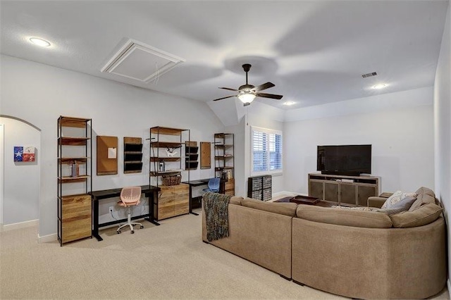 10210 Grape Creek Grove Ln, Cypress, TX 77433 - living area with attic access, light colored carpet, ceiling fan, lofted ceiling, and arched walkways