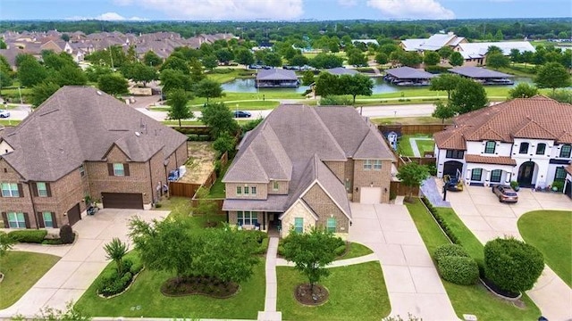 10210 Grape Creek Grove Ln, Cypress, TX 77433 - aerial perspective of suburban area with a large body of water