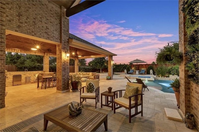 10210 Grape Creek Grove Ln, Cypress, TX 77433 - fenced backyard with an outdoor hangout area, an in-ground hot tub, and a patio area