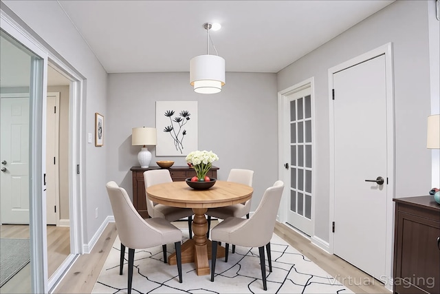 10260 Field Stone Dr, Houston, TX 77041 - dining room featuring light wood finished floors and baseboards