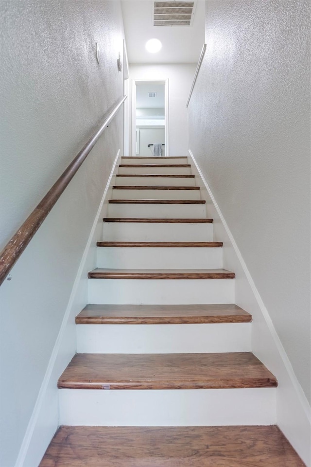 10260 Field Stone Dr, Houston, TX 77041 - stairway featuring wood finished floors