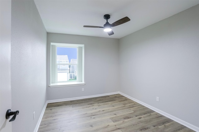 10260 Field Stone Dr, Houston, TX 77041 - empty room featuring a ceiling fan and wood finished floors