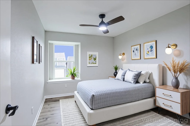 10260 Field Stone Dr, Houston, TX 77041 - bedroom with wood finished floors and a ceiling fan