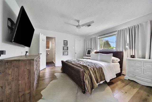 5503 Cheshire Ln, Houston, TX 77092 - bedroom with wood finished floors and a ceiling fan